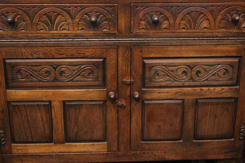 A VERY GOOD 'JAYCEE' OAK DRESSER, with raised gallery shelf to the back, 2 drawers over 2 door - Image 2 of 6