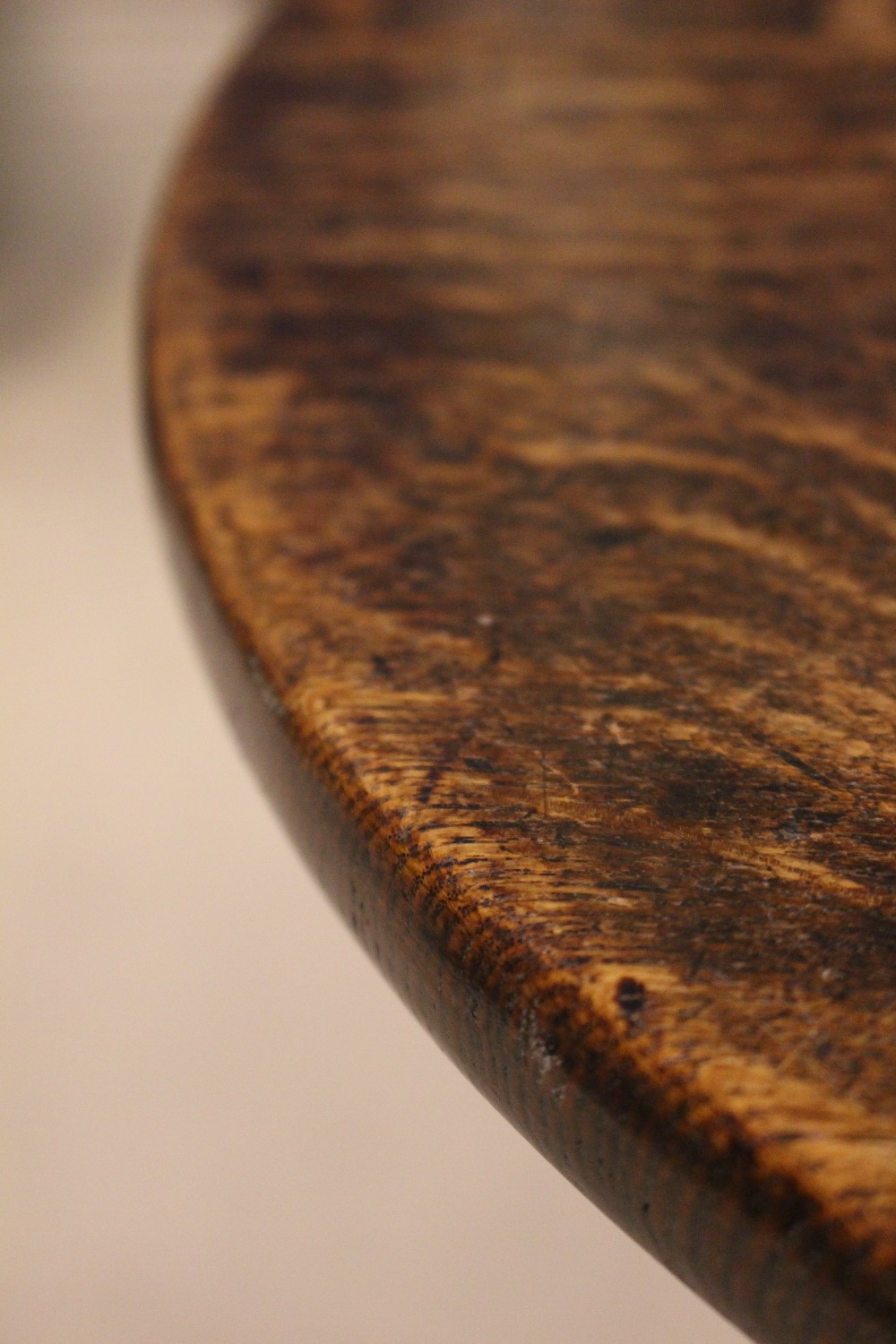 AN 18TH CENTURY TIP UP CENTRE TABLE, with oak top and fruit wood base, a column support on a - Image 4 of 4