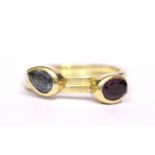 A PAIR OF 18CT YELLOW GOLD 'STACKING' RINGS, with ruby & aqua marine coloured stones