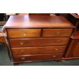 A CHEST OF DRAWERS, 2 over 3 drawers, with brass drop handles, raised on bracket feet, 42" x 19" x
