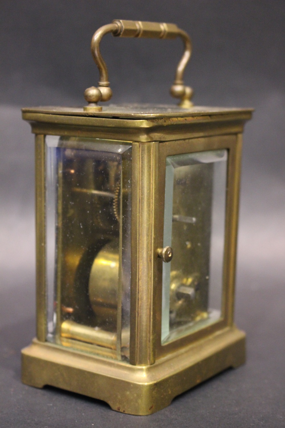 A FRENCH CASH CARRIAGE CLOCK, brass frame, bevelled glass on all sides, 5" x 4" x 3.5" approx case - Image 7 of 7
