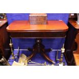 A VERY FINE WILLIAM IV MAHOGANY FOLD OVER TEA TABLE, raised on turned baluster shaped column