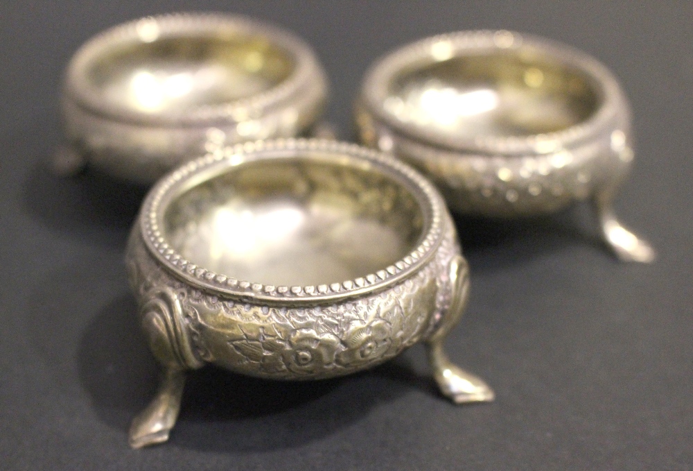 A SET OF 3 19TH CENTURY SALT CELLARS / CAULDRONS, each decorated with floral embossed design, and - Image 4 of 7