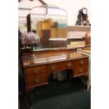 A QUEEN ANNE STYLE DRSESSING TABLE, with 5 drawers, a pair on either side with a long central