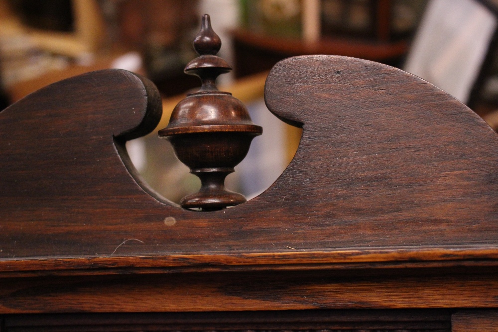 A BOXED WALL CLOCK, with turned finial to the top, brass and enamel face, keys within, 36" x 14" x - Image 3 of 3