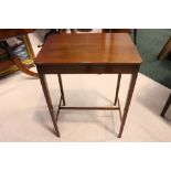 A MAHOGANY SIDE / "CHAMBER" TABLE, with rounded corners, raised on tapered square legs, united by