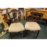 A PAIR OF PIERCED SPLAT BACKED SHIELD BACK CHAIRS, raised on square leg, united by H stretchers