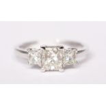 AN 18CT WHITE GOLD PRINCESS CUT 3 STONE DIAMOND RING, diamonds: .44 cts. .95 cts., .44 cts.