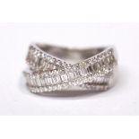 AN 18CT WHITE GOLD BAGUETTE & BRILLIANT CUT DIAMOND CROSS OVER BAND, 2.00cts.