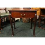 AN IRISH 'TEA' OR 'SILVER' TABLE, with raised rim, single frieze drawer with brass handle, raised on