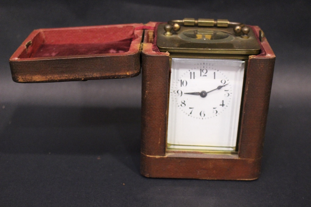 A FRENCH CASH CARRIAGE CLOCK, brass frame, bevelled glass on all sides, 5" x 4" x 3.5" approx case - Image 2 of 7