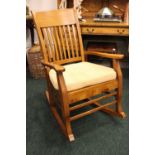 A LARGE ROCKING CHAIR, with slatted seat, and cushion, 39.5" x 26" x 20" approx