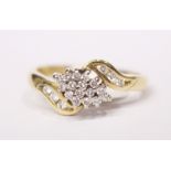 AN 18CT YELLOW GOLD DIAMOND CLUSTER RING, .85cts. diamonds