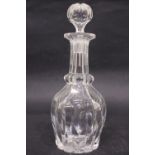 A NARROW NECKED GLASS DECANTER, minor chip to mouth