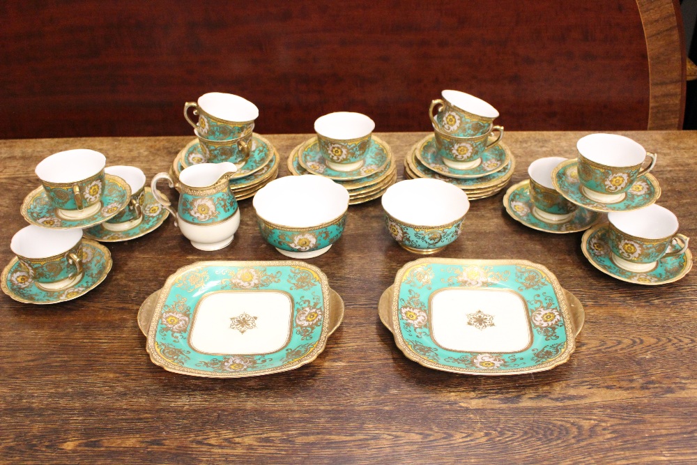 A MIETO CHINA TEA SET, includes; (11) cups, (9) saucers, (12) plates, (2) bowls, (2) sandwich / cake