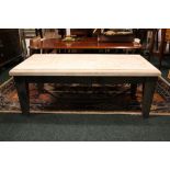 A STONE TOPPED COFFEE TABLE, two tone top with foliage motif, raised on frame with tapered legs