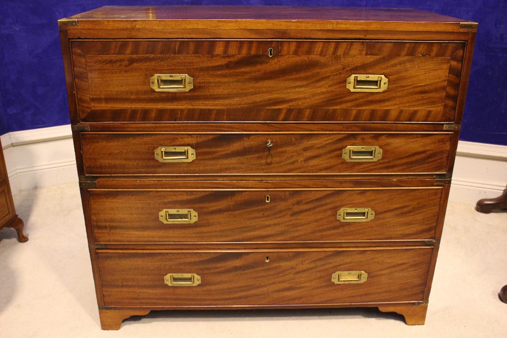 A REGENCY 'CAMPAIGN' BRASS BOUND CHEST SECRETAIRE, Mahogany, with crossbanded front detail to the