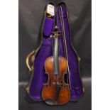 A CASED VIOLIN, with bow, baring label within, "Antonius Stradivarius Cremonent, AS, Faciebat Anno