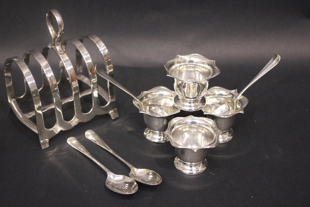 A SILVER BREAKFAST SET, includes; (4) Egg Cups, Birmingham, with date letter 'k' for 1909, maker's