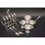 A SILVER BREAKFAST SET, includes; (4) Egg Cups, Birmingham, with date letter 'k' for 1909, maker's