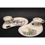 TWO CLARICE CLIFF 'PALETTE' PLATES WITH CUPS, (i) Royal Staffordshire cup and plate, with flower box