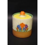 A CLARICE CLIFF 'CROCUS' DESIGN PRESERVE JAR, with lid, floral decoration, marks beneath, 3.5" x