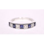 AN 18CT WHITE GOLD SAPPHIRE & DIAMOND RING, with alternating blue sapphire and diamonds