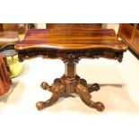 VERY FINE QUALITY 19TH CENTURY ROSEWOOD SERPENTINE SHAPED FOLD-OVER TEA TABLE, raised on an