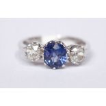 A PLATINUM 3 STONE SAPPHIRE & DIAMOND RING, sapphire 1.20cts., diamond .88cts.