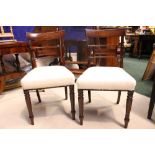 A PAIR OF SIDE / DINING CHAIRS, with gadrooned top rail, panel back support, stuffed over seats,