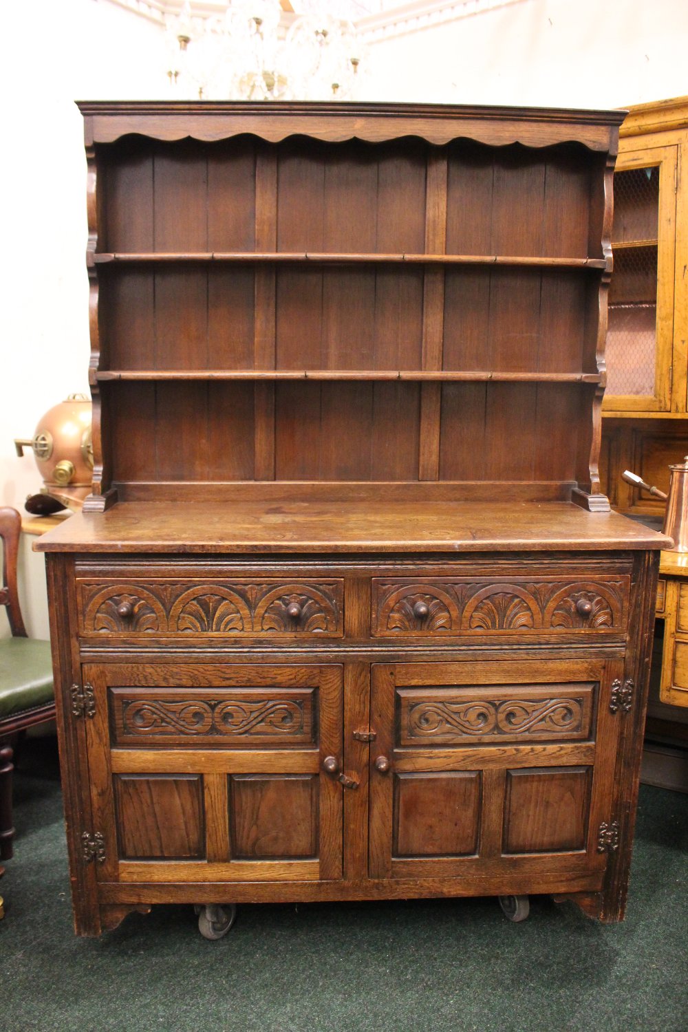 A VERY GOOD 'JAYCEE' OAK DRESSER, with raised gallery shelf to the back, 2 drawers over 2 door