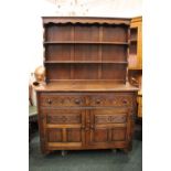 A VERY GOOD 'JAYCEE' OAK DRESSER, with raised gallery shelf to the back, 2 drawers over 2 door