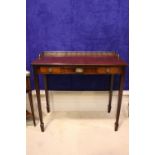 A FINE GEORGIAN SIDE / HALL TABLE, with brass gallery rail to the back and sides, 3 frieze