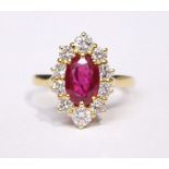 AN 18CT YELLOW GOLD RUBY AND DIAMOND RING