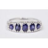 AN 18CT SAPPHIRE & DIAMOND 5 STONE ‘GYPSY’ RING