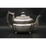 A VERY FINE EARLY 19TH CENTURY IRISH SILVER TEA POT, decorated with bright-cut design all over,