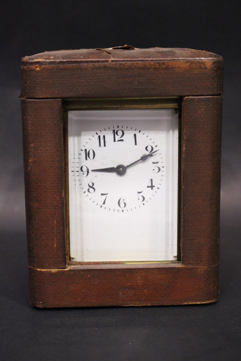 A FRENCH CASH CARRIAGE CLOCK, brass frame, bevelled glass on all sides, 5" x 4" x 3.5" approx case