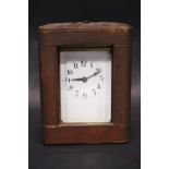 A FRENCH CASH CARRIAGE CLOCK, brass frame, bevelled glass on all sides, 5" x 4" x 3.5" approx case