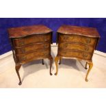 A PAIR OF DROP LEAF WALNUT SIDE CABINETS / TABLES, each with serpentine shaped 3 drawer chest