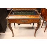 A LATE 19TH CENTURY INLAID ‘BIJOUTERIE’ / DISPLAY TABLE, with good quality ormolu mounts & a brass