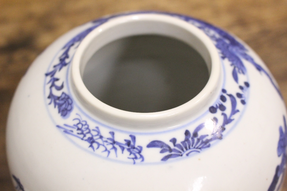 A BLUE & WHITE GINGER JAR with lid, decorated with images of children and a woman playing in a - Image 4 of 7