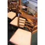 A SET OF 6 DINING ROOM CHAIRS, with inlaid detail to the crest rails, spring lift up seats, turned