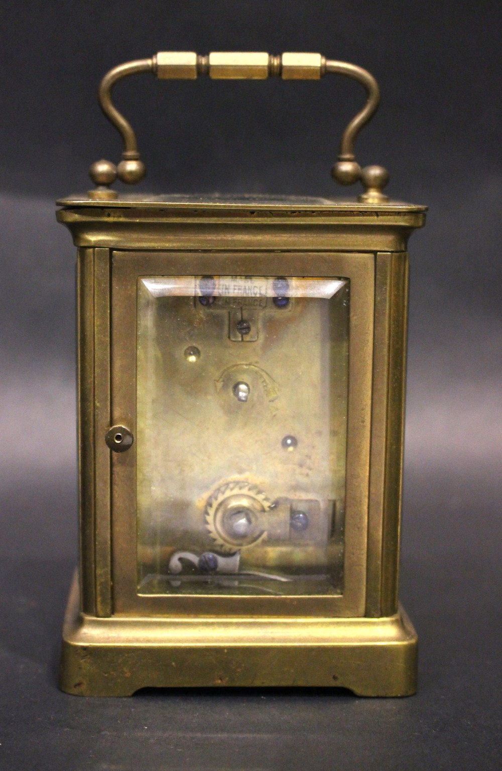 A FRENCH CASH CARRIAGE CLOCK, brass frame, bevelled glass on all sides, 5" x 4" x 3.5" approx case - Image 6 of 7
