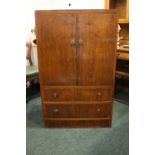 A MID CENTURY MODERN CABINET, with 2 door cabinet over 2 drawers beneath, each with conical shaped