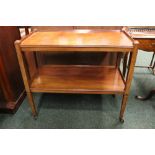 A TWO TIER WHAT NOT / SERVING TABLE, with reeded tapering legs on castors, 36" x 18" x 32.5" approx