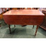 A DROP LEAF PEMBROKE TABLE, with faux drawers, raised on turned leg, 38" x 21" x 29.5" approx, in