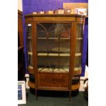 A FINE BOW ENDED BREAKFRONT GLAZED DISPLAY CABINET, decorated with marquetry & string inlaid
