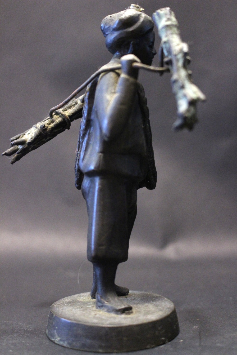 A 19TH CENTURY MINATURE BRONZE SCULPTURE, Possibly Japanese, of a boy carrying bamboo, 13cm high - Image 4 of 5