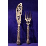 A 19TH CENTURY SILVER SERVER SET, consisting of knife and fork, both bright cut decorated, the knife