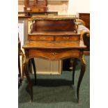 A LATE 19TH CENTURY THREE TIER LADIES WRITING DESK, a raised shelf with ¾ gallery edge, decorated